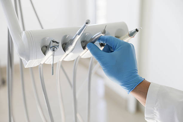 Professional Tooth Extraction technician working in Charlevoix, MI